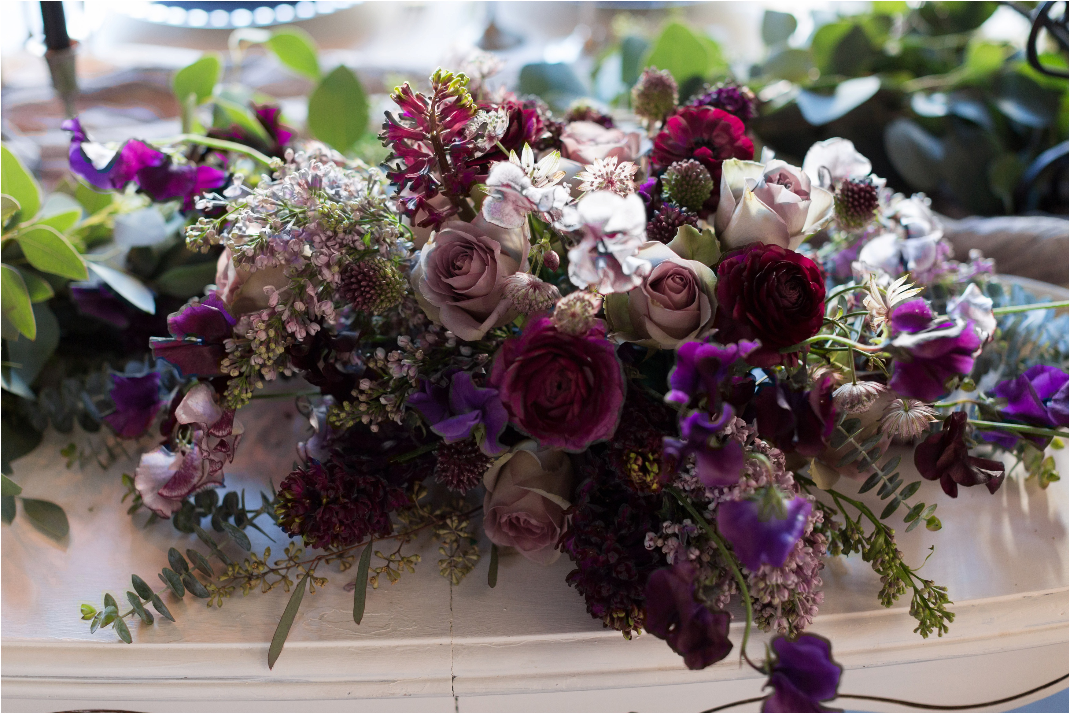 purple wedding bouquet by Riane Roberts Photography 