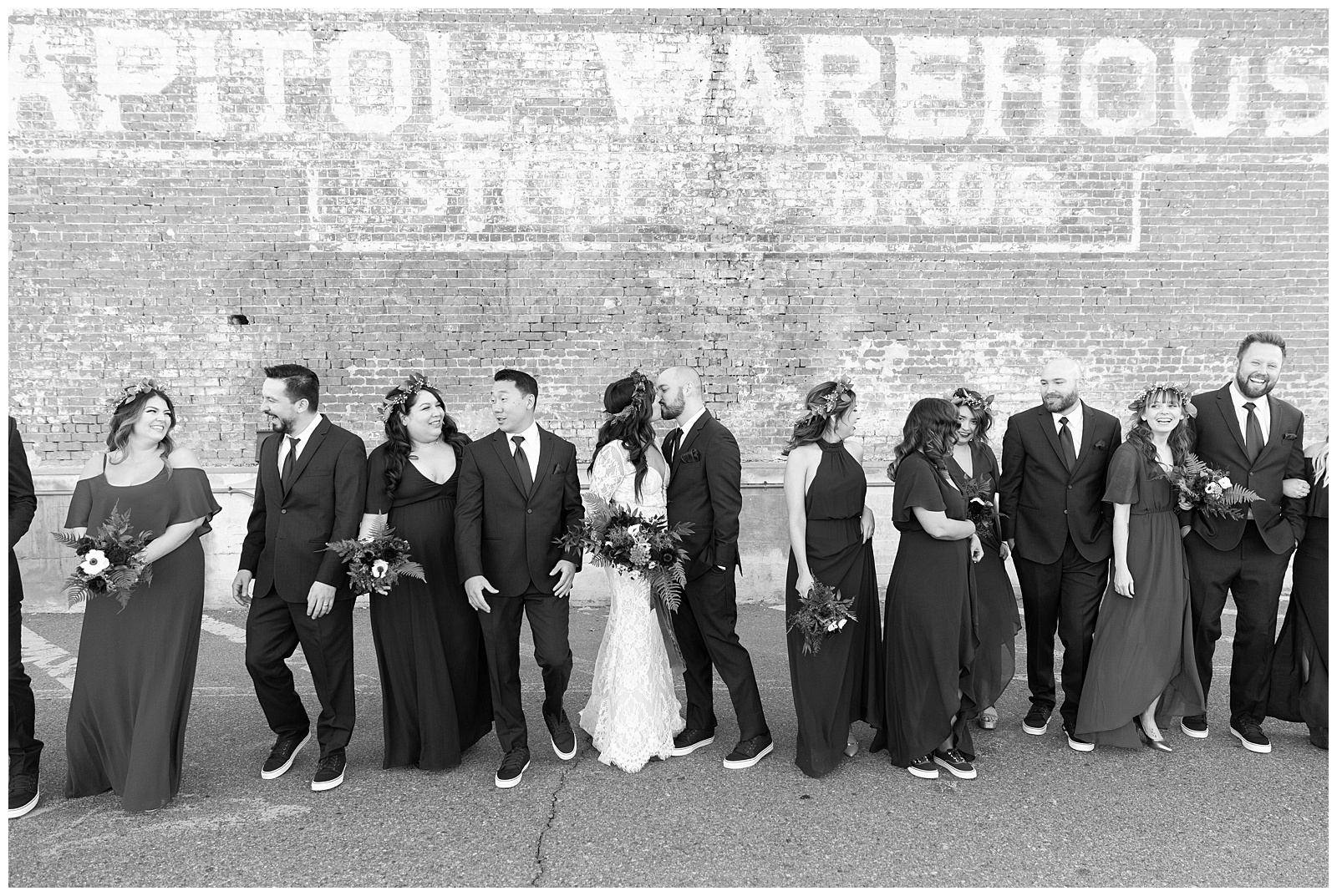 Black and white photo of bridesmaids and groomsmen in downtown phoenix