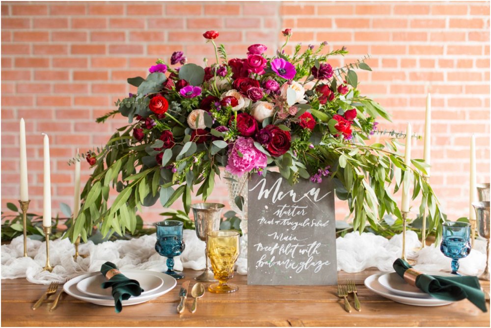pink and red floral table top decorations photo