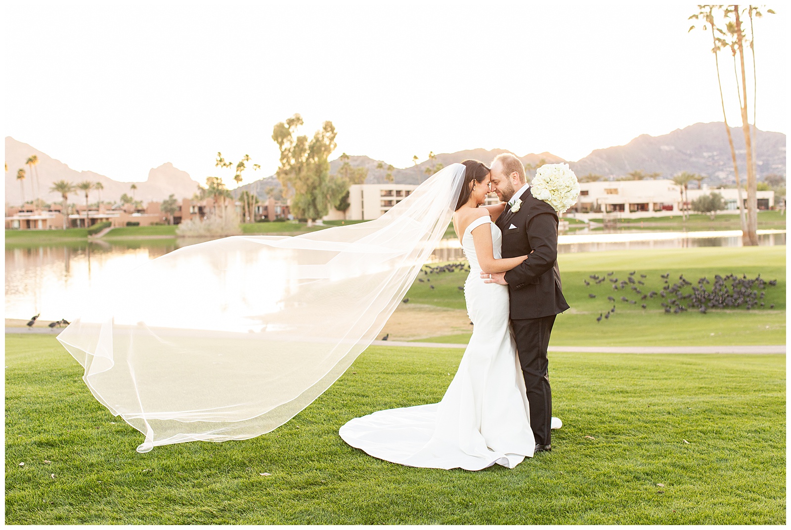 Classic bride and groom shot overlooking McCormick Ranch Golf Club, Scottsdale AZ